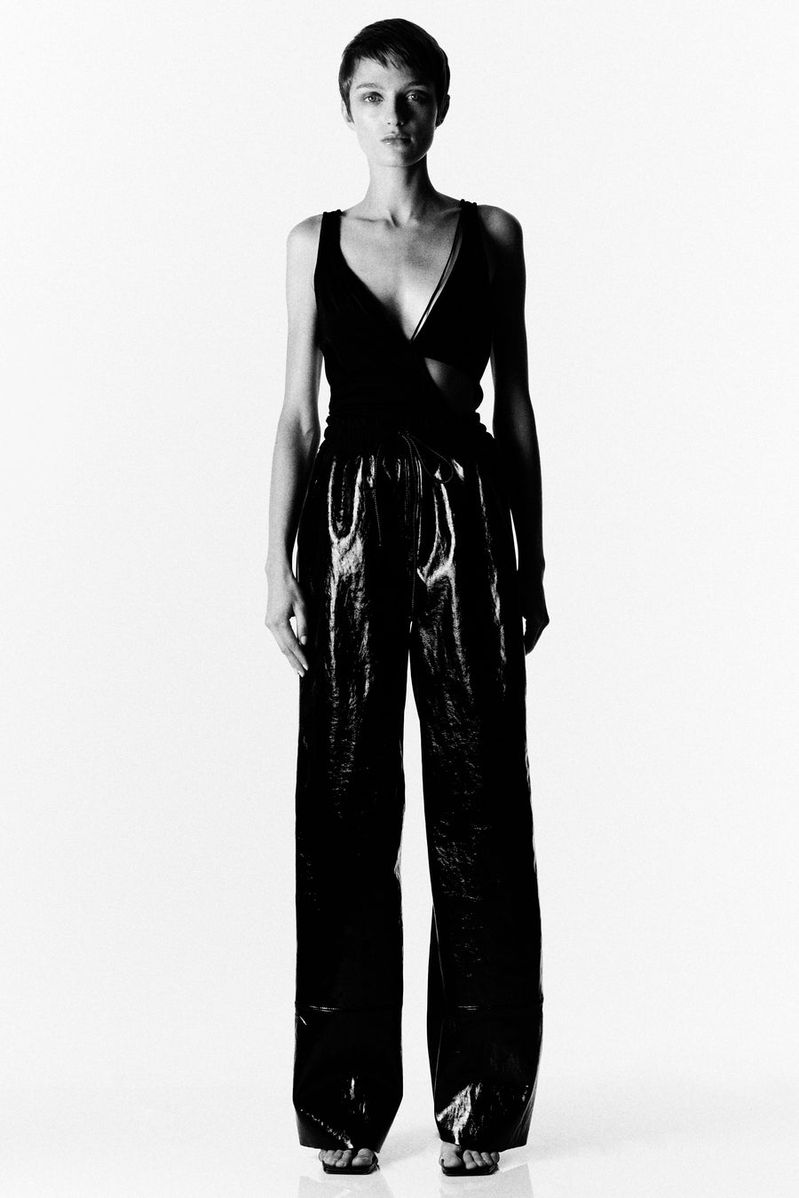 PATENT LEATHER PANTS WITH MESH PANEL